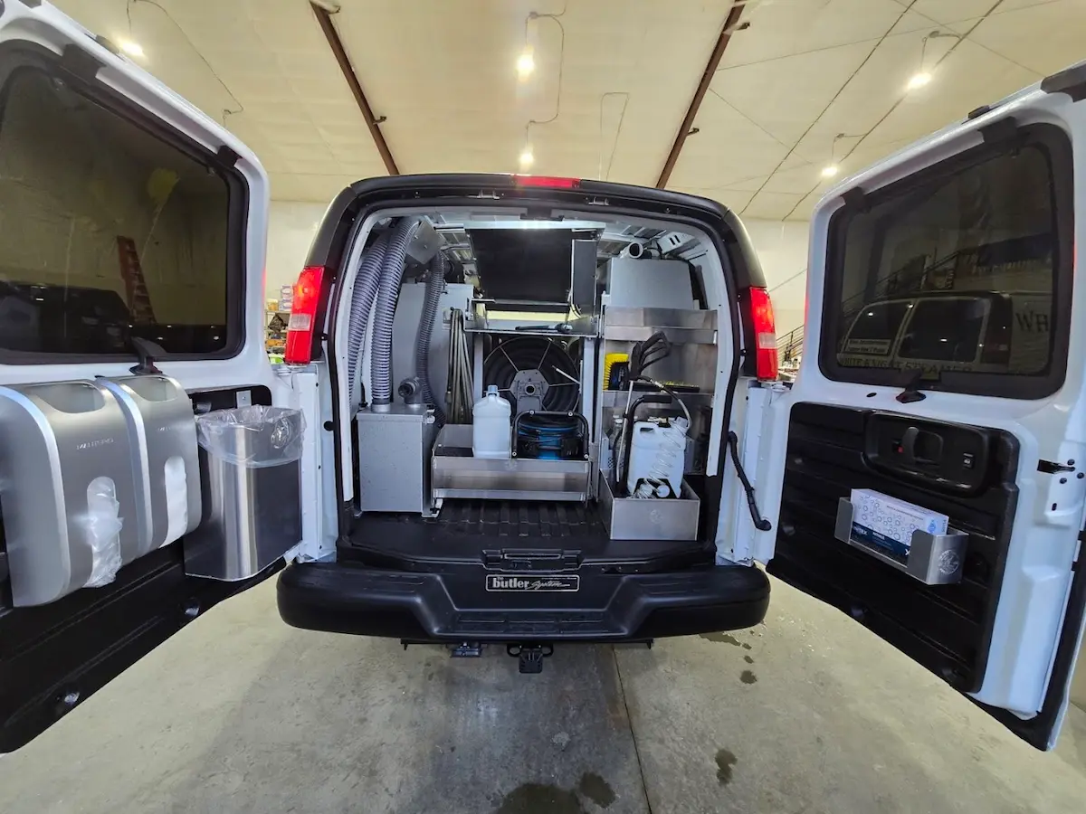 White Knight Steamer service van with truck-mounted Butler cleaning system used for commercial carpet cleaning